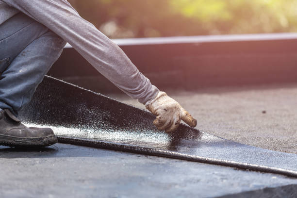 Professional Waterproofing technician working in Oceanside, NY